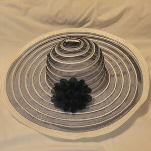 Chic Striped Hat with Floral Accent